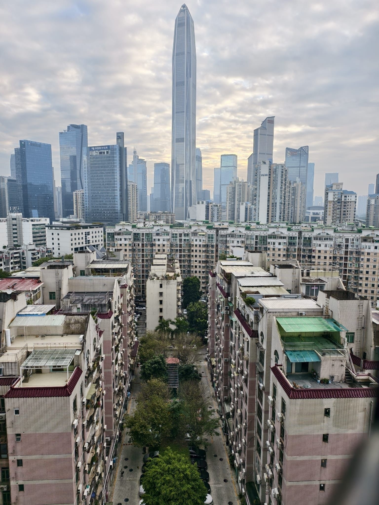 A random screenshot showing a Shenzhen skyline. Old high-rises next to new ones